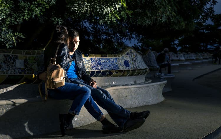 Couple in Park Guell at night