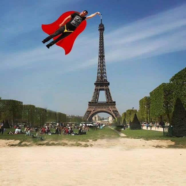 Superman's finger touches Eiffel tower