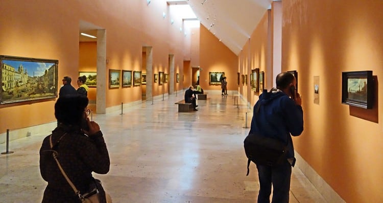 Tourists use audio guide at Thyssen Museum