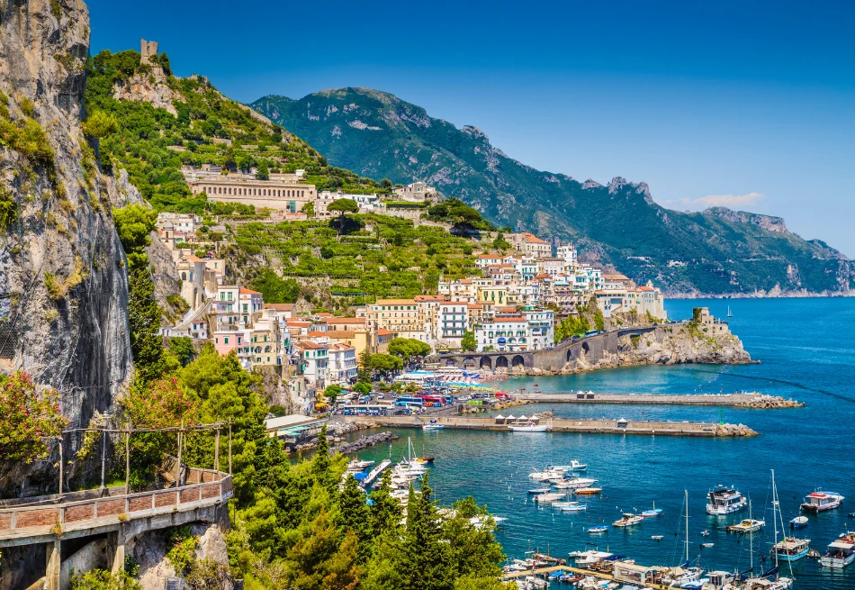 Scenic picture-postcard view of the beautiful town of Amalfi at famous Amalfi Coas