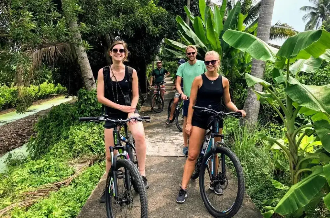 Tourists exploring Bangkok on the bike tour