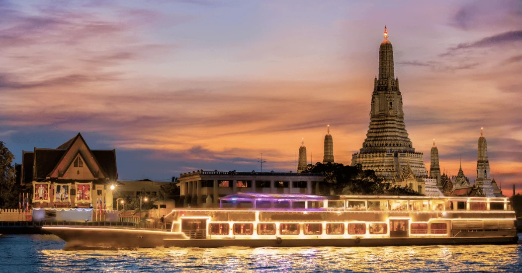 Chao Phraya river cruise with the backdrop of Wat Arun