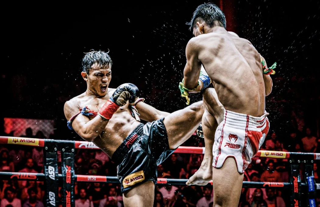 Two fighters indulge in Muay Thai Boxing