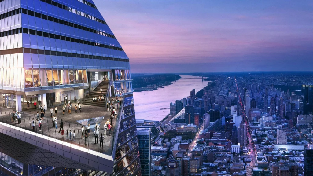 Visitors enjoying the outdoor sky deck at Edge NYC during sunset, with panoramic views of the Hudson River and Manhattan skyline.