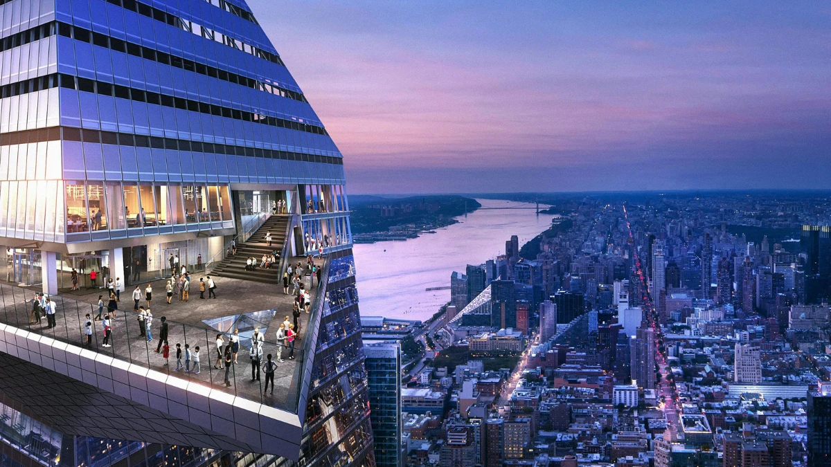 Visitors enjoying the outdoor sky deck at Edge NYC during sunset, with panoramic views of the Hudson River and Manhattan skyline.
